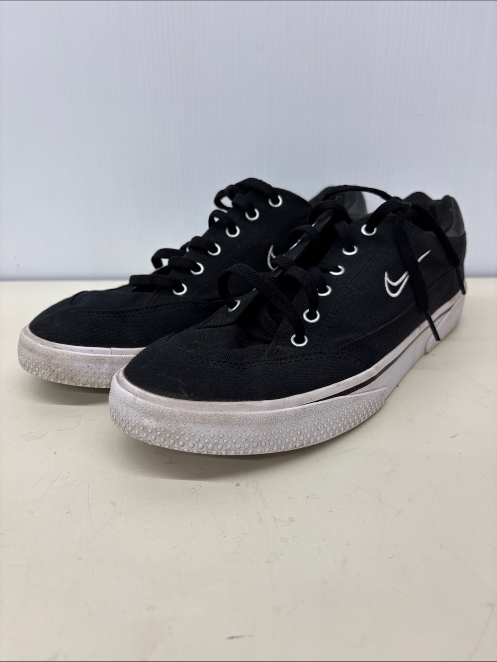 Nike Black Canvas Low-Top Sneakers with White Swoosh